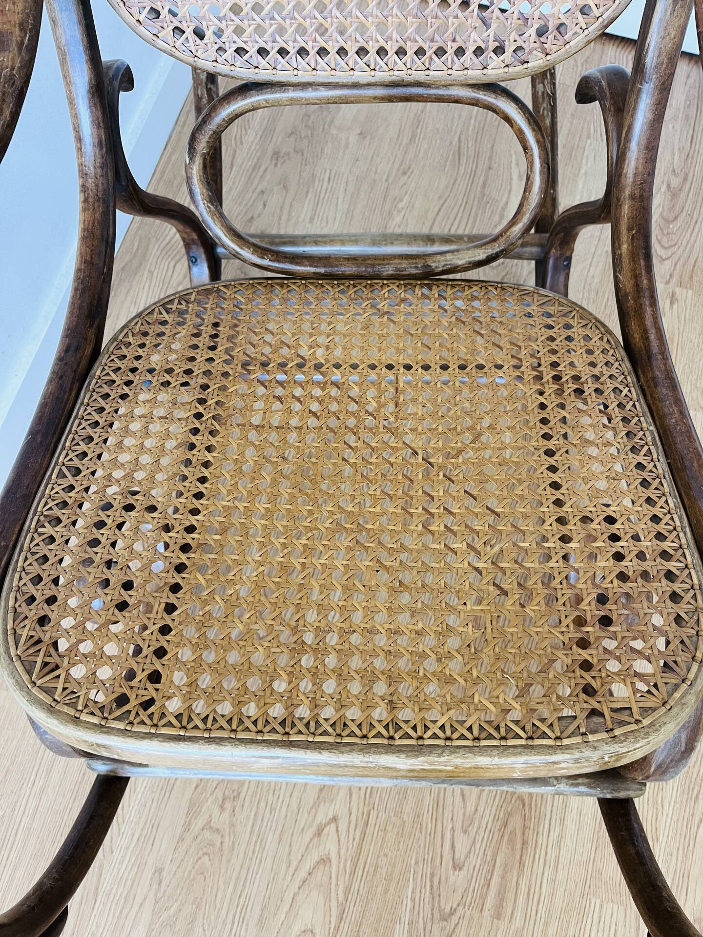 Antique Thonet bentwood rocking chair, original label.