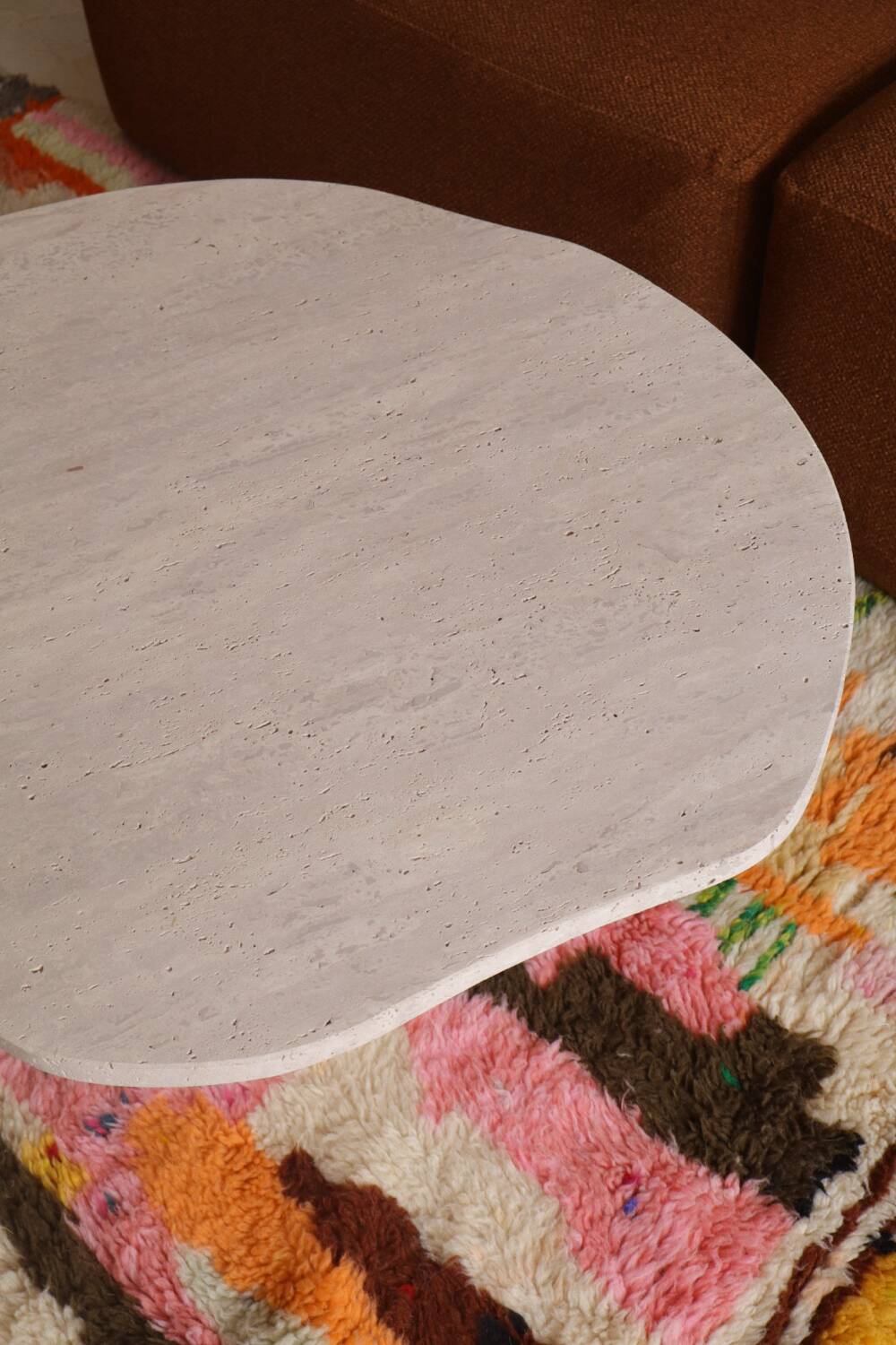 Organic shape travertine coffee table