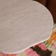 Organic shape travertine coffee table