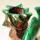 Vase coquillage en barbotine vert et marron, années 70