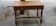 Antique wooden flat desk with two drawers