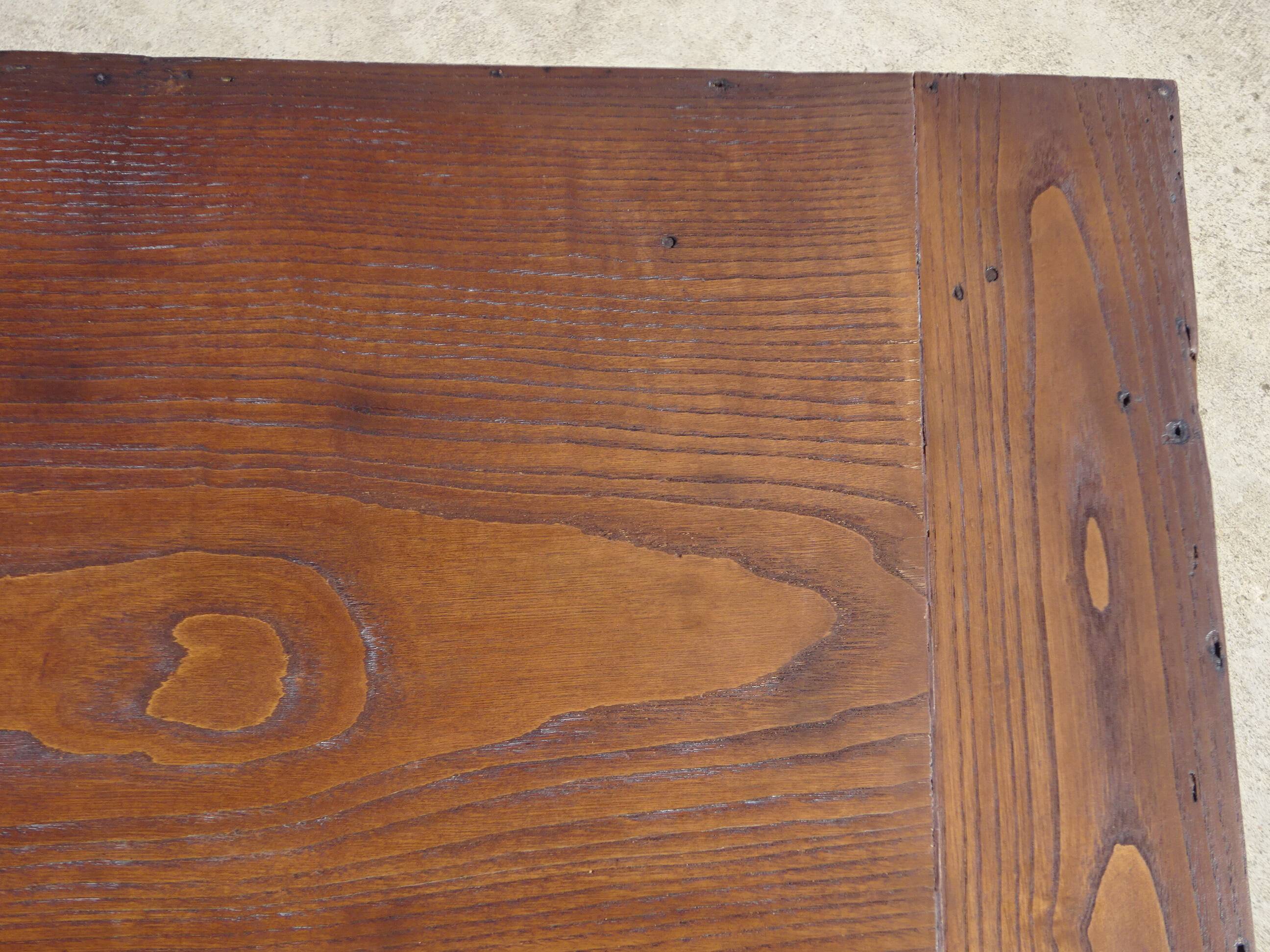 Old farmhouse table made entirely of restored solid oak.
