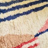 Béni Ouarain rug with stripes and geometric patterns