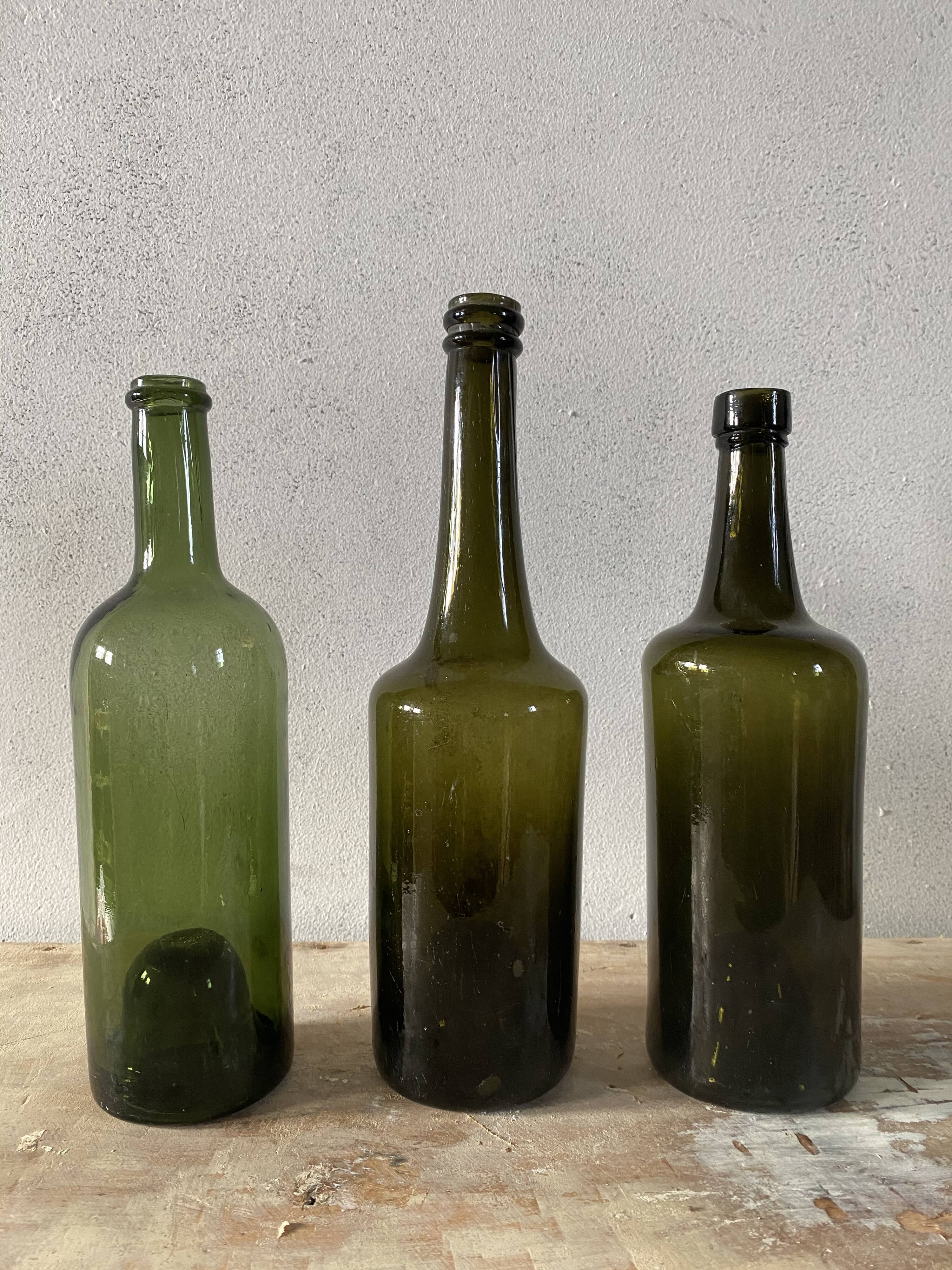 Set of 3 old blown glass bottles