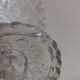 Arabesque molded crystal display cup serrated edges