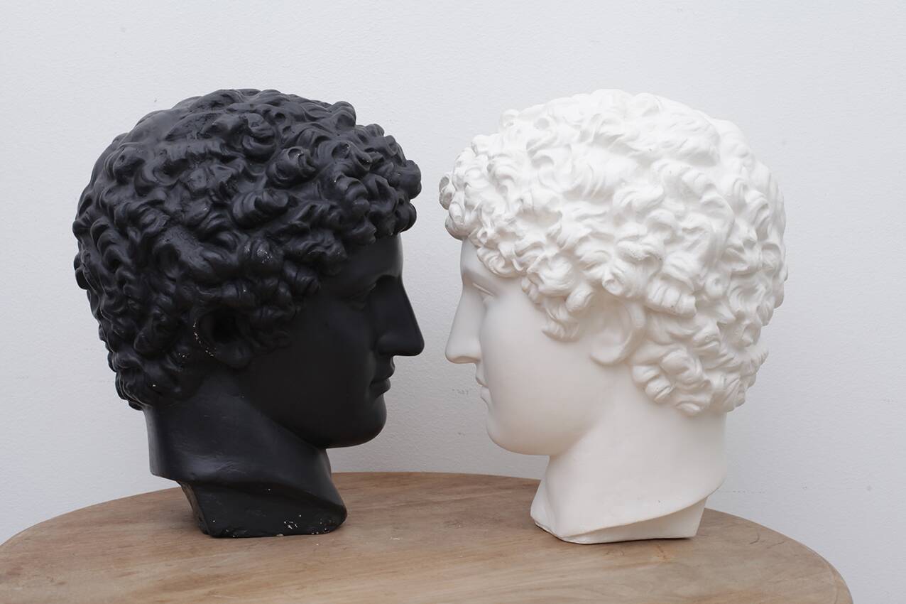 Greek head in waxed black plaster