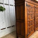 Spanish furniture with carved wood profiles and coats of arms from the 1950s.