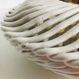 Covered basket in woven ceramic and fruit slip.