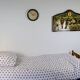 Vintage folding bed – wood and metal – 206 cm – rustic charm and practicality