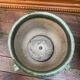 Old glazed terracotta pot cover