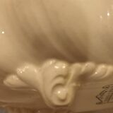 Old earthenware dish on foot