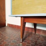 Wooden sideboard in soft green