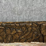 Central Africa 20th century: carved wooden panel in bas-relief of elephants