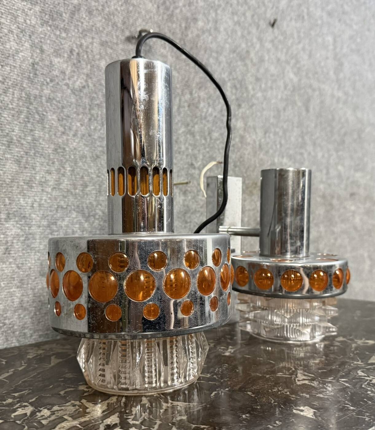 Two vintage space age pendant lamps by Raak, 1970