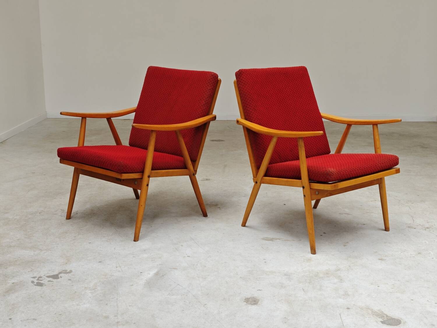 Pair of red Boomerang armchairs by Antonin Suman for Ton Bystrice Thonet