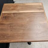 Bistro table with cast iron base and teak top