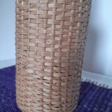 Old high wicker glass bottle