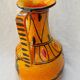 Orange ceramic jug