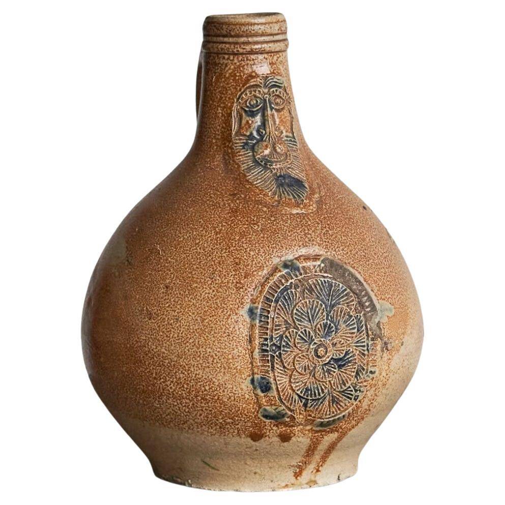Bartmann jug / Bellarmine 17th century in salt-glazed stoneware