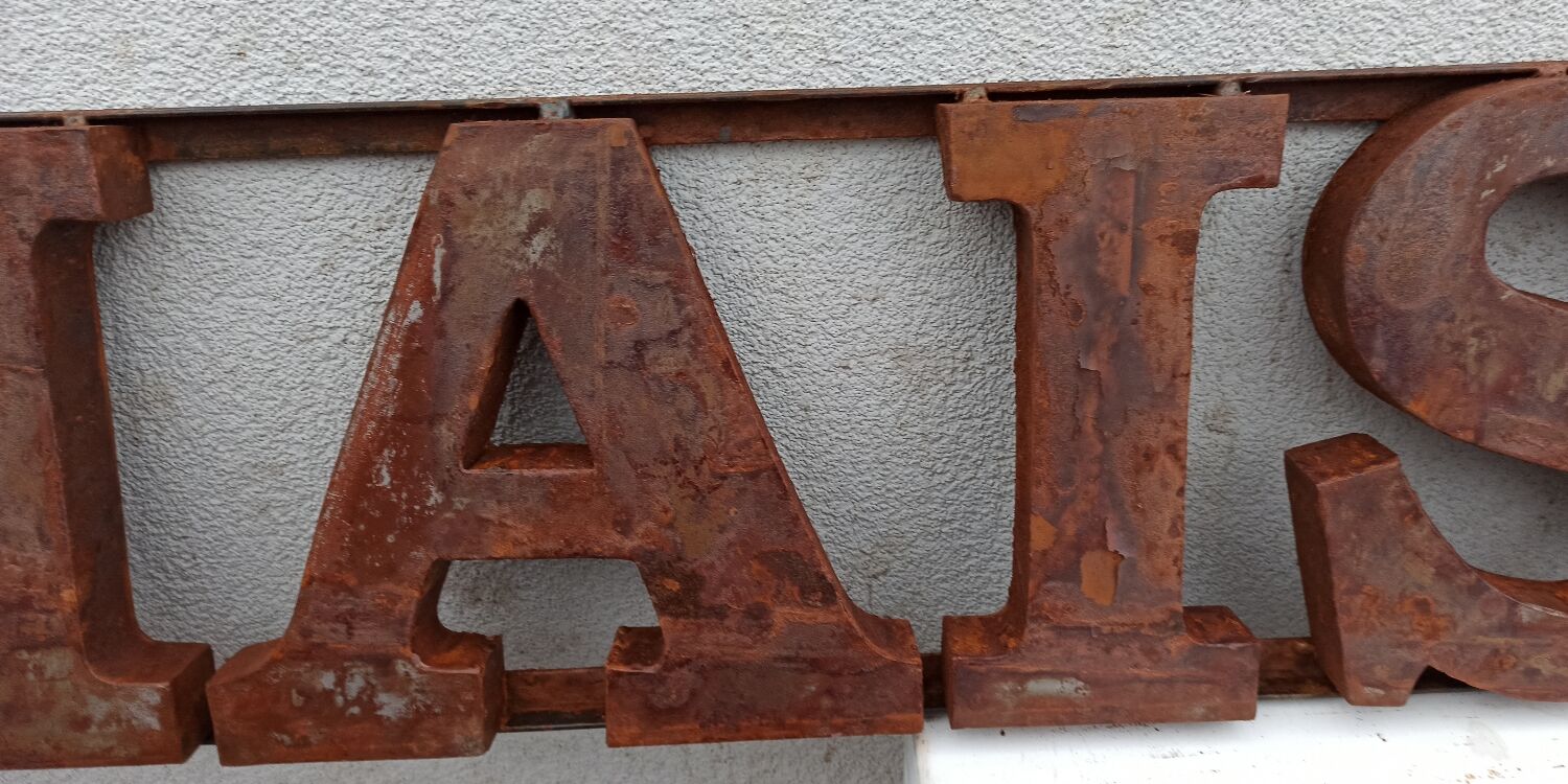 Rusty metal plate HOME