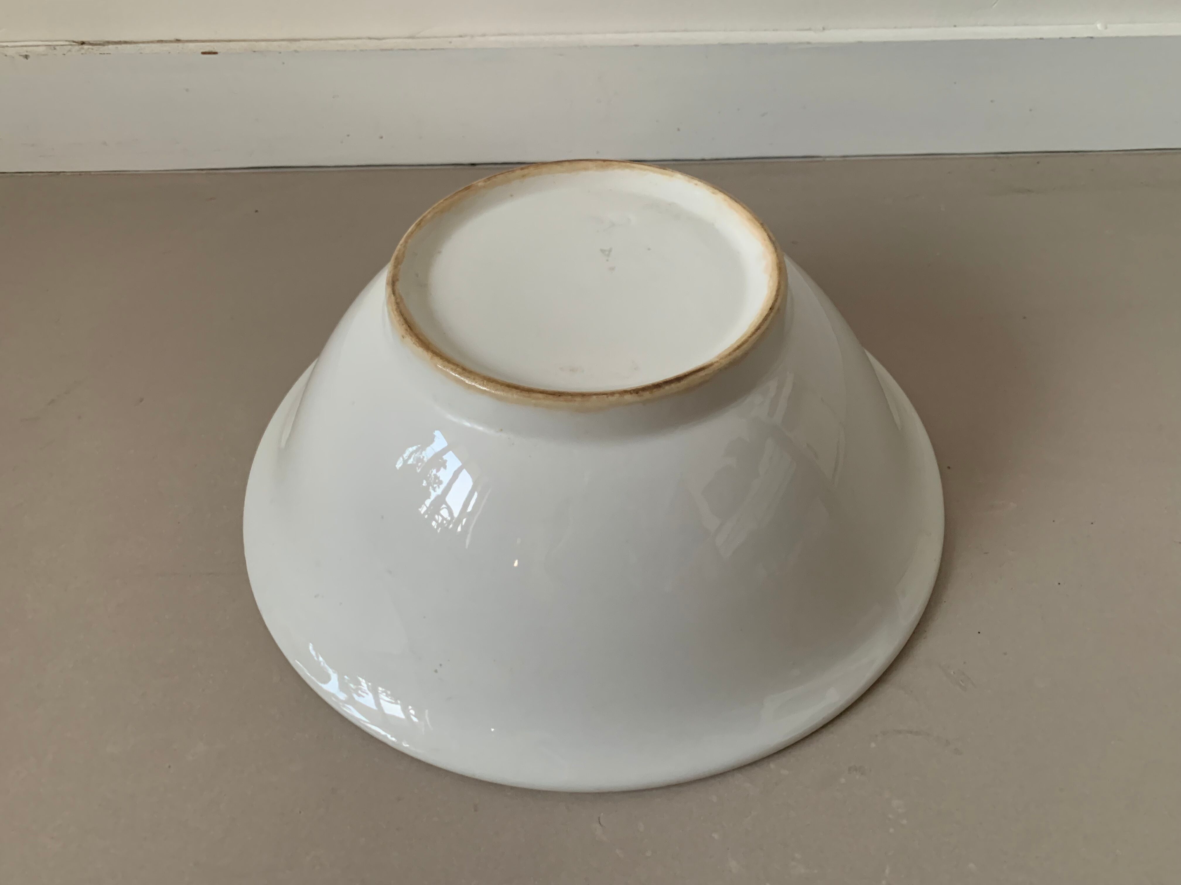 Old white salad bowl