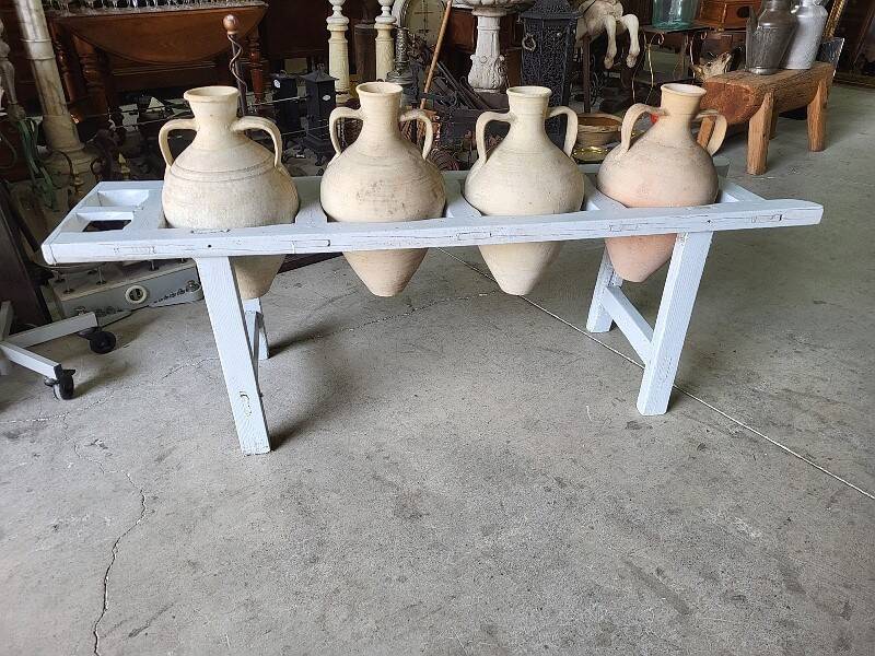 Antique painted wooden jar holder with 4 earthenware jars