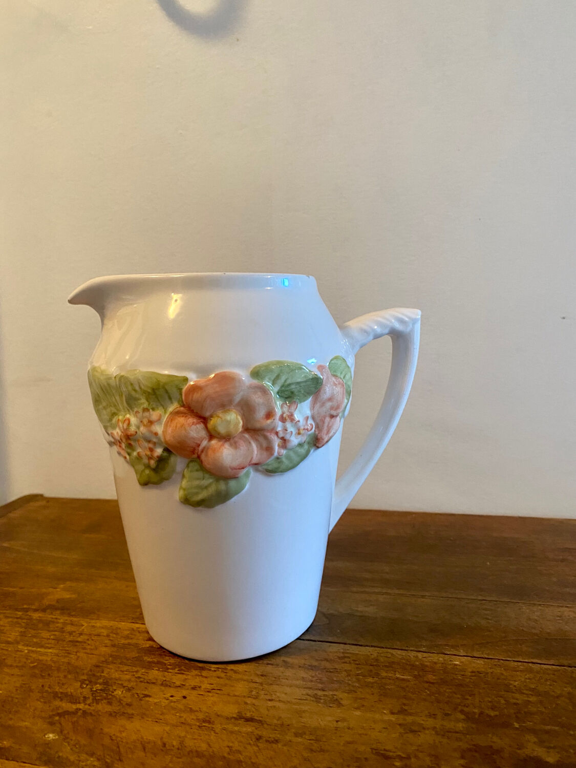 Pretty peach colored flower carafe