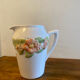 Pretty peach colored flower carafe