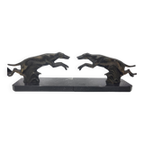 Pair of bookends, greyhounds in babbitt on black marble, Art Deco early 20th century