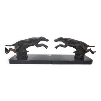 Pair of bookends, greyhounds in regula on black marble, Art Deco early 20th Century