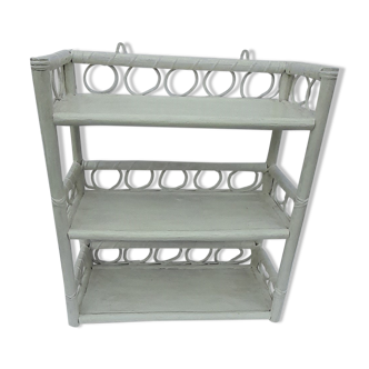 White rattan wall shelf