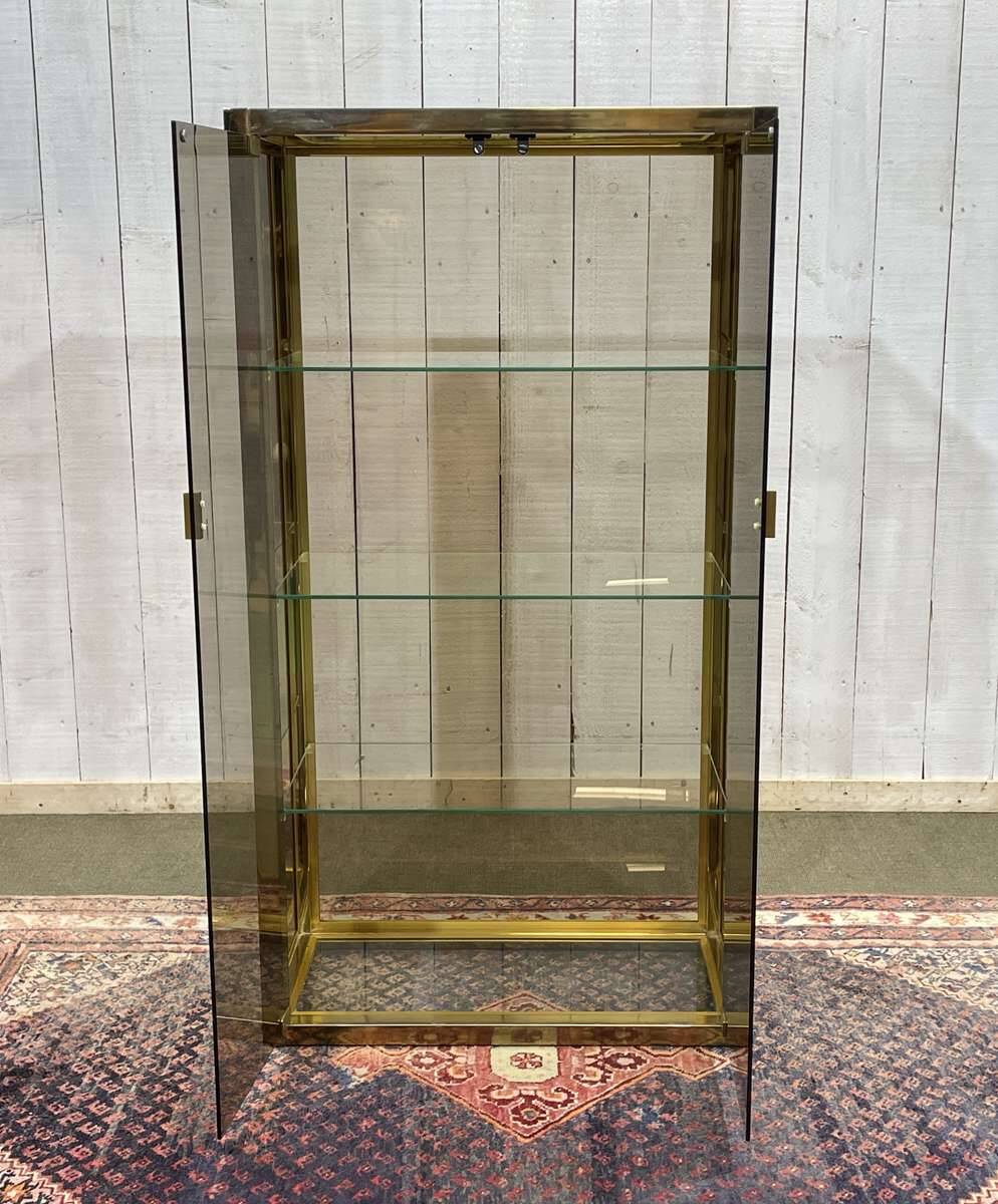 Exhibition showcase in gold-plated chrome and smoked glass - work from the 1980s.