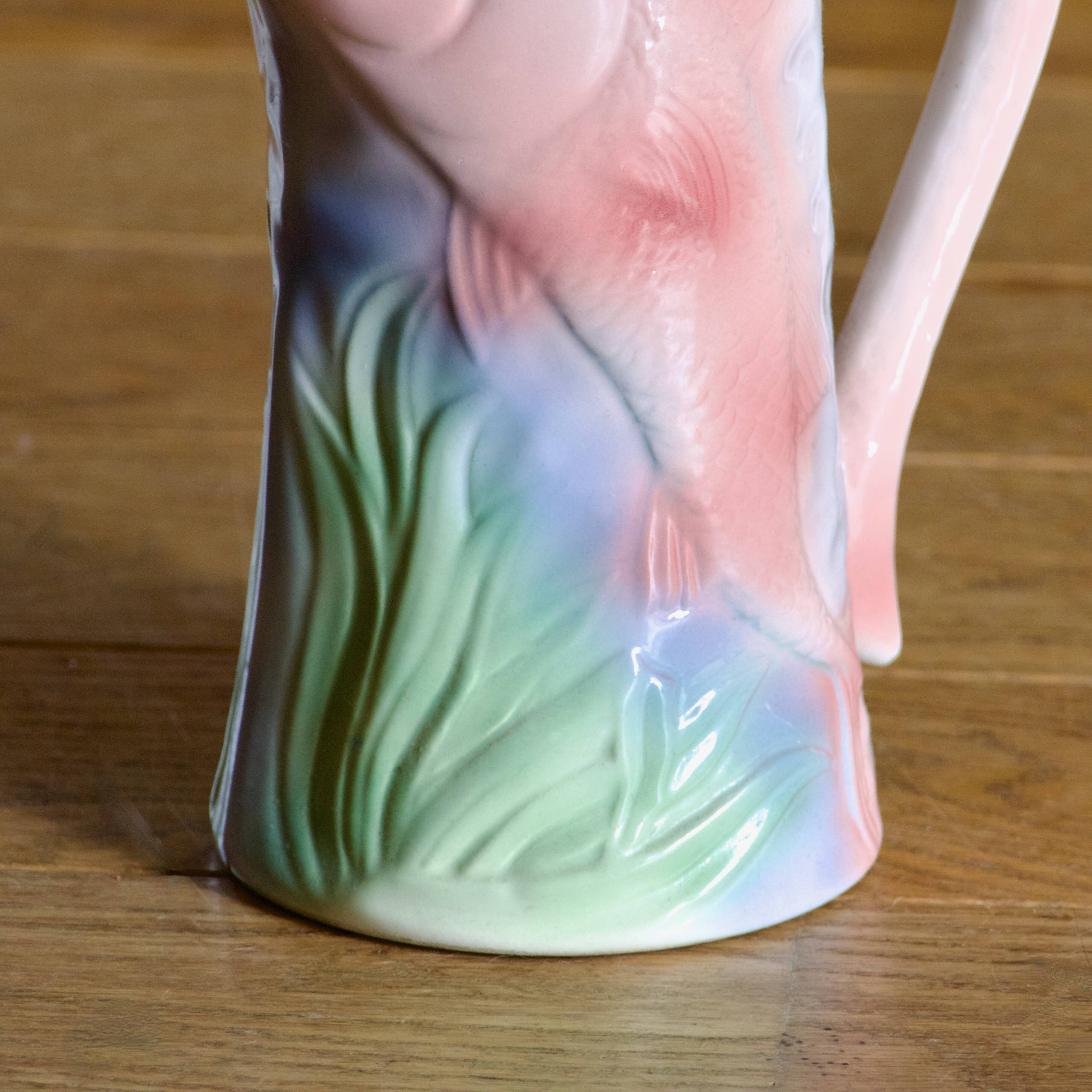 Vintage carafe in colorful fish slip