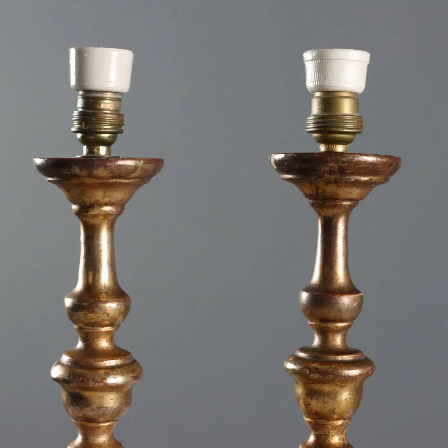 Pair of antique carved wooden candlesticks, Italy, 19th century