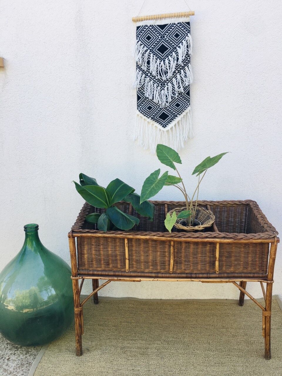 Veranda planter on vintage wicker legs