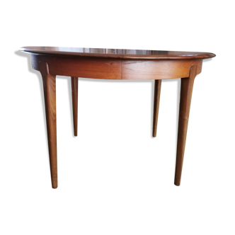 Scandinavian-style teak dining table in the 60s
