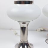 Pair of vintage futuristic style table lamps in chrome and opal glass.