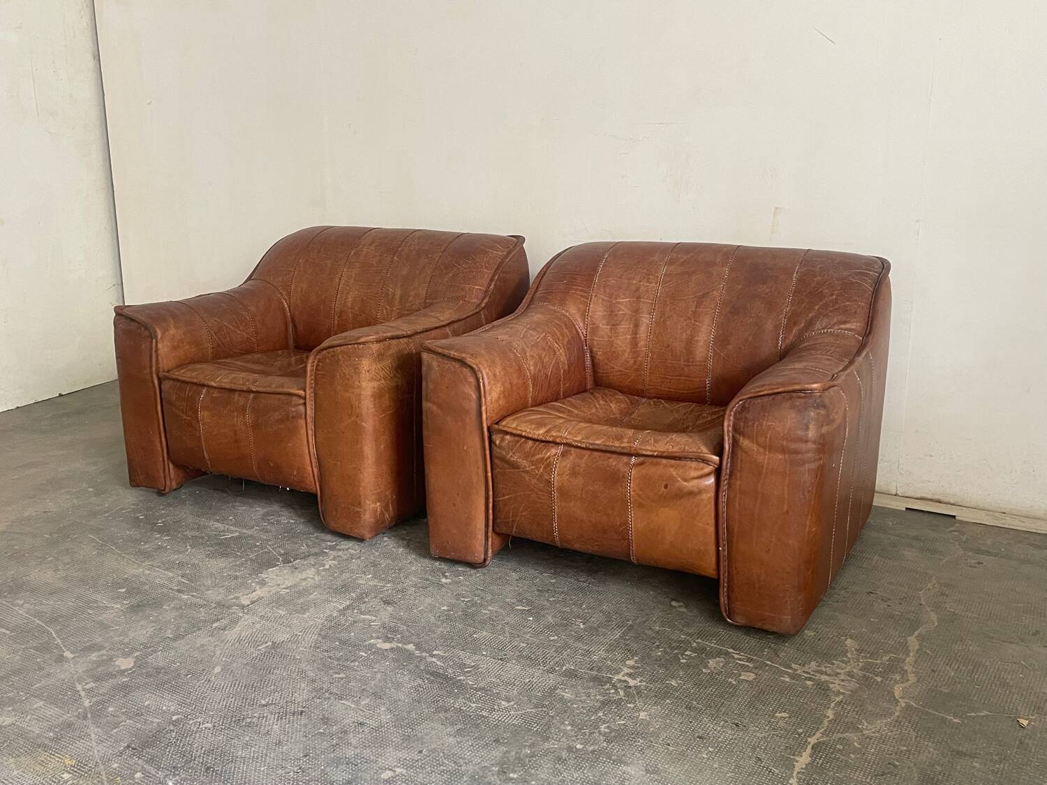 Pair of leather armchairs