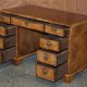 Antique Victorian desk with two pedestals in burr walnut and leather.