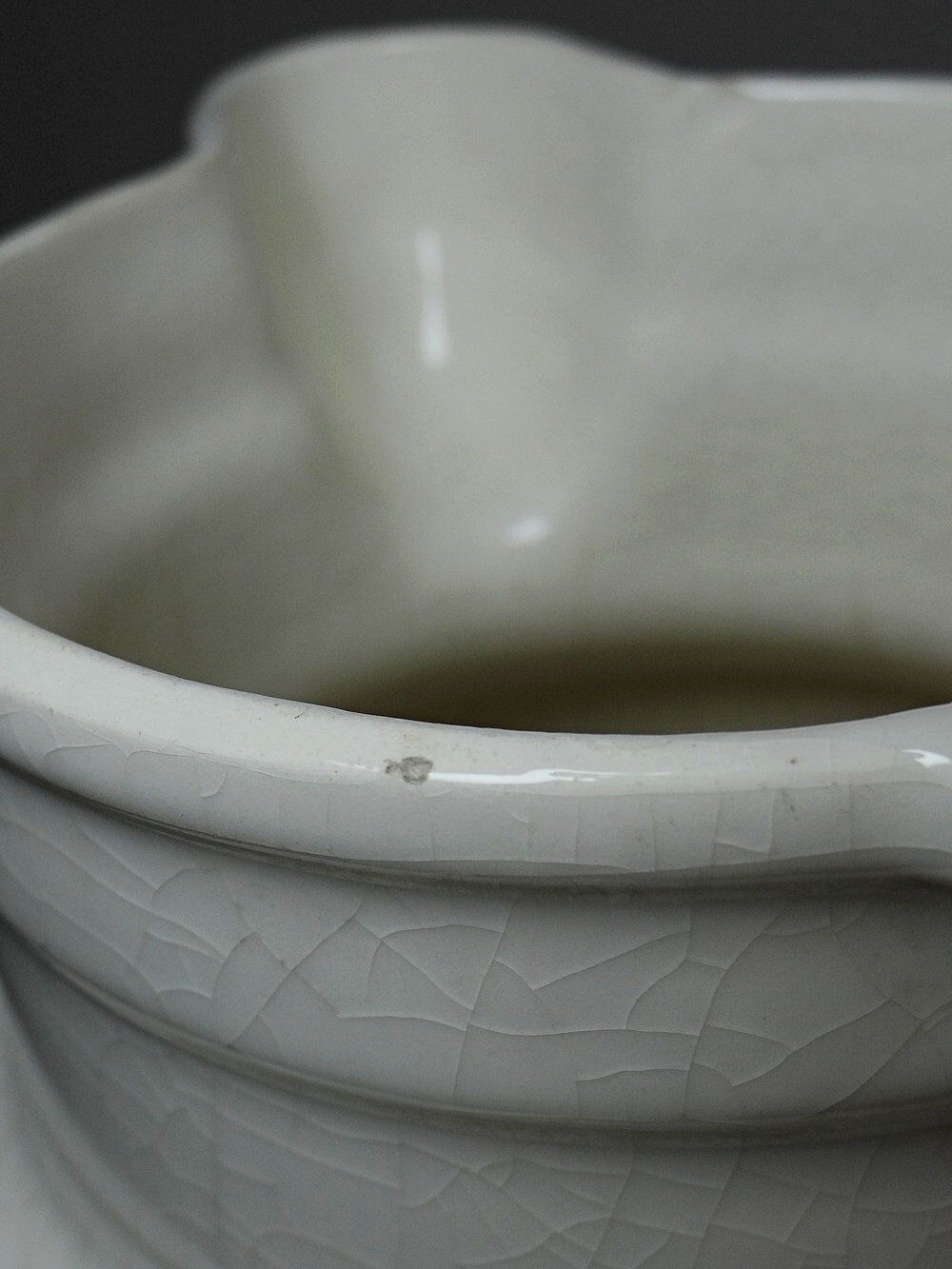 Large Art Deco toilet bowl, antique cracked faience.