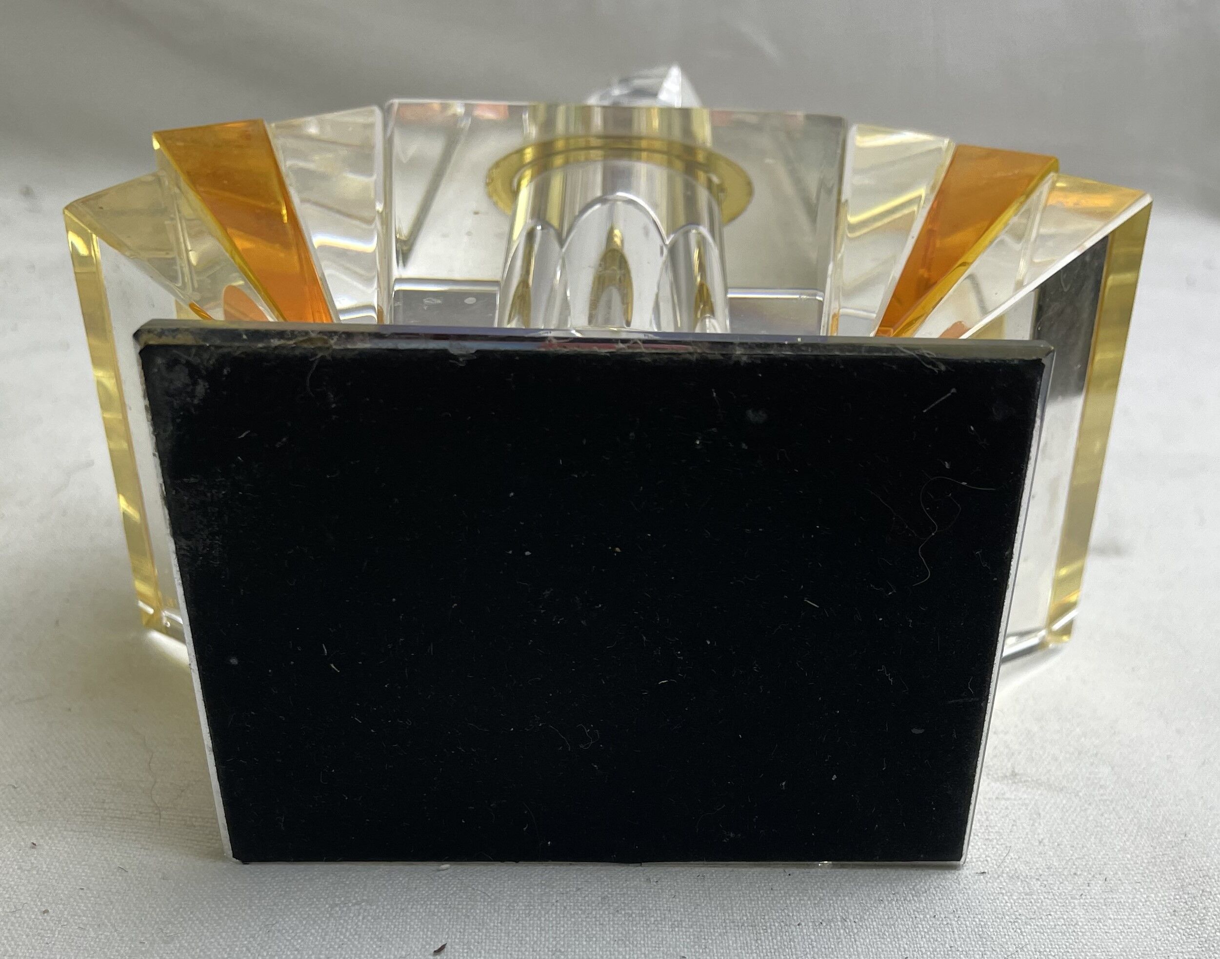 Empty art deco perfume bottle in amber crystal