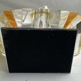 Empty art deco perfume bottle in amber crystal