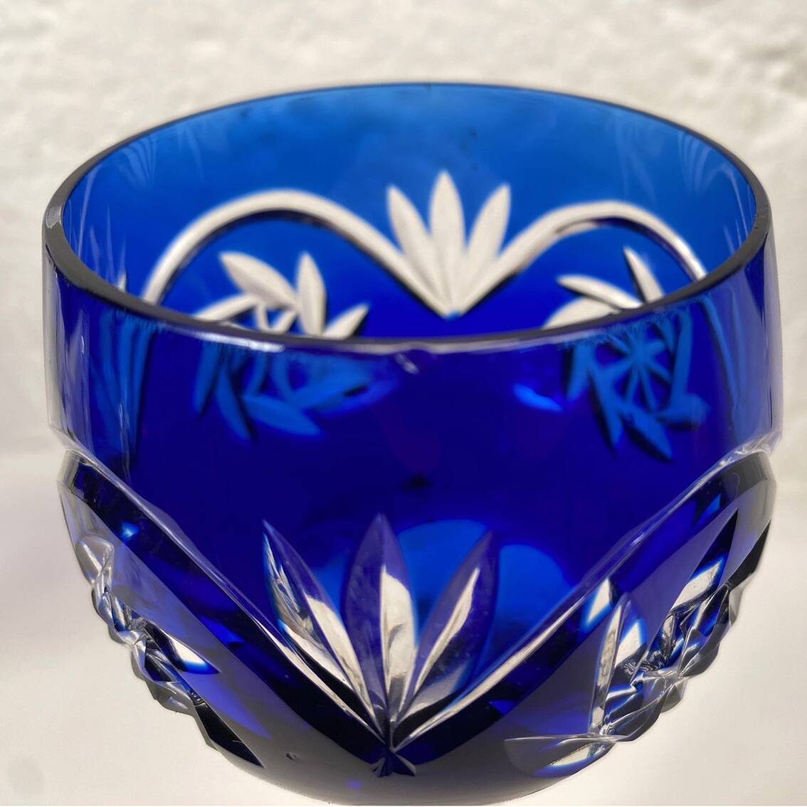 Bohemia. Series of six cut crystal wine glasses from the Rhine in blue.