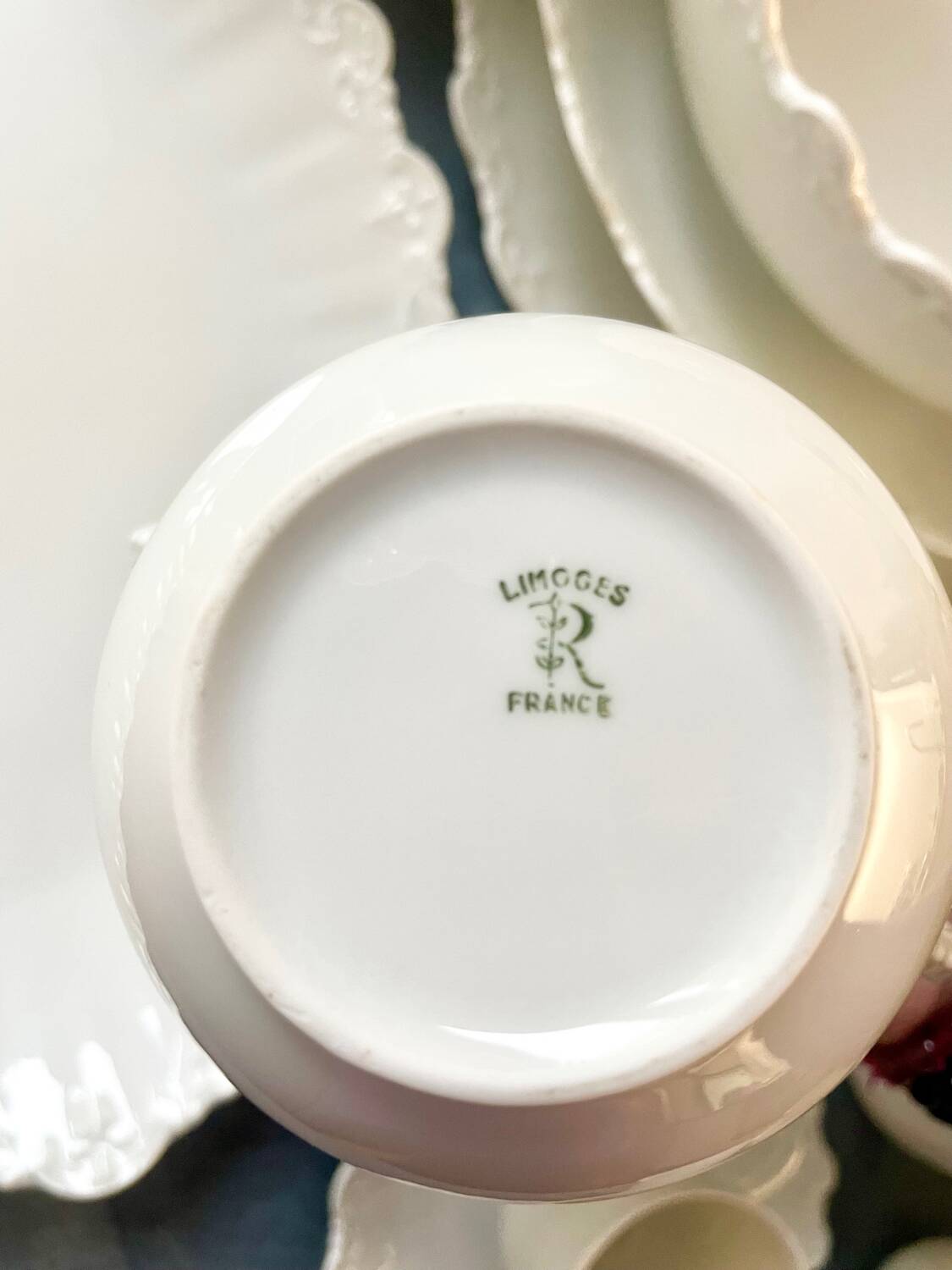 Prestigious 62-piece dinnerware set in vintage 70's Limoges white porcelain by Raynaud