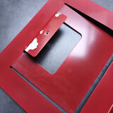 Vintage red metal wall magazine rack