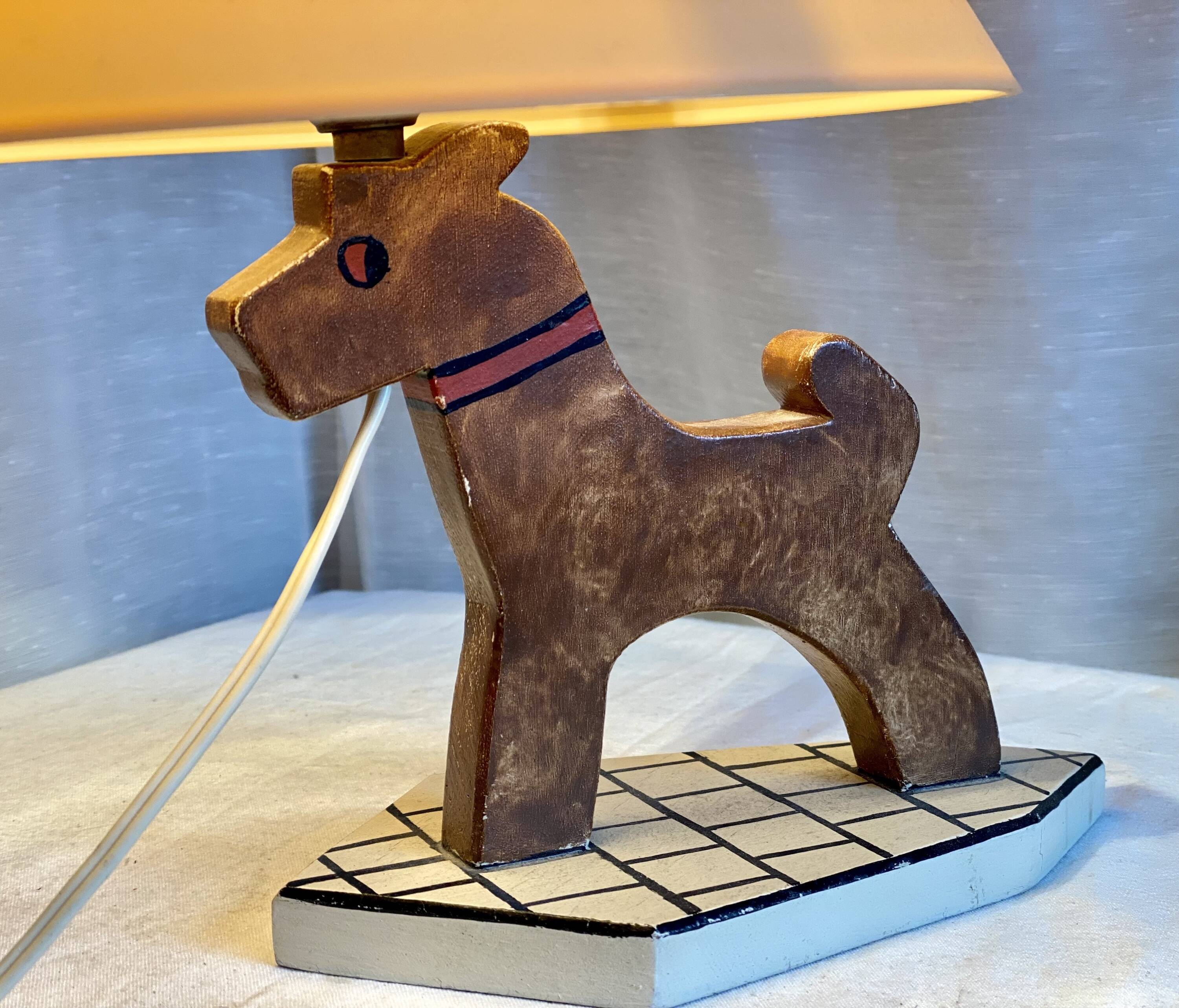 Vintage 1970s polychrome wooden lamp in the shape of a dog.