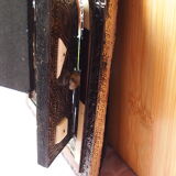 Vintage Moroccan mirror with chiseled pewter shutters