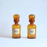 2 flacons d'apothicaire antiques avec bouchons en forme de dôme, années 1900