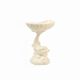 Dartmouth pottery koi carp supporting a shell-shaped dish/vase.