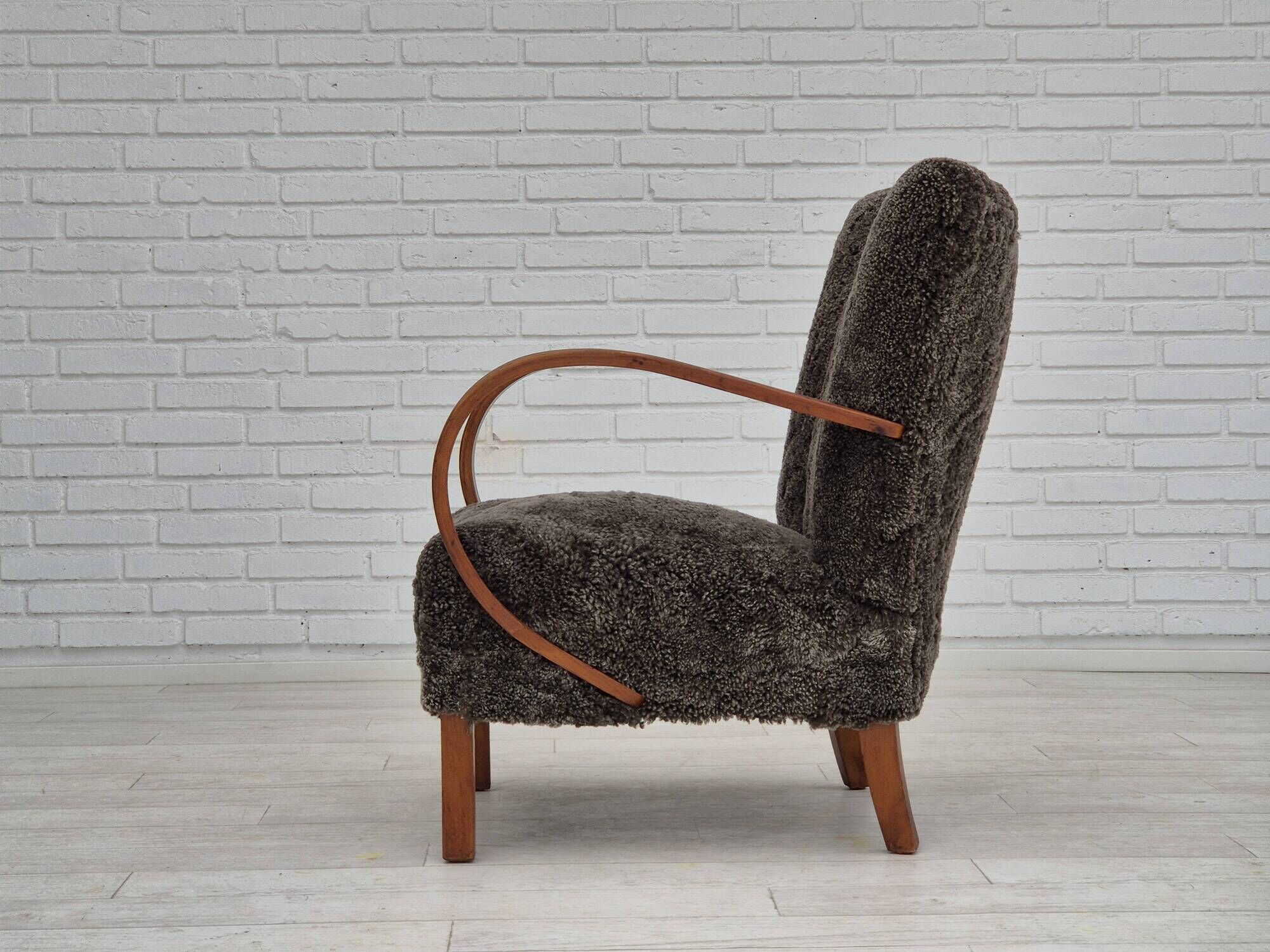 1950s, Danish design, reupholstered armchair, genuine sheepskin "Wellington".